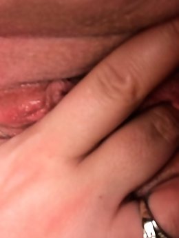 A sexy woman is exposing her buttocks in these photographs.