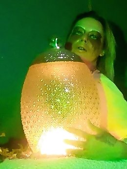 A sexy woman in black clothing vaporises