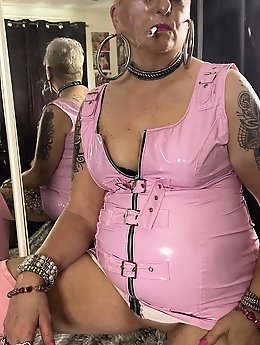 A blonde woman plays with her shaved pussy showcasing sensual skills