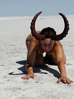 Standing on laps naked on the salt of the salt lake Elton