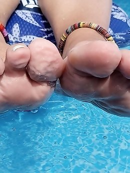 Mature woman with pierced genitalia in a seductive image collection